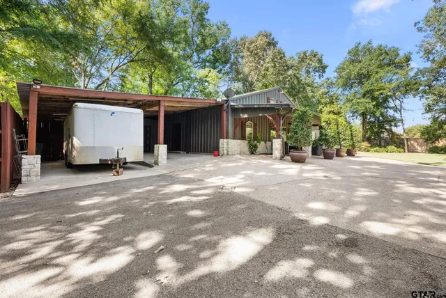 a view of a car in front of a house