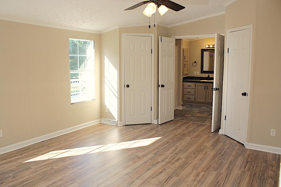 5128 Starks Road Cross Plains, TN 37049 - Photo 4 of 17 wooden floor in an empty room with a window