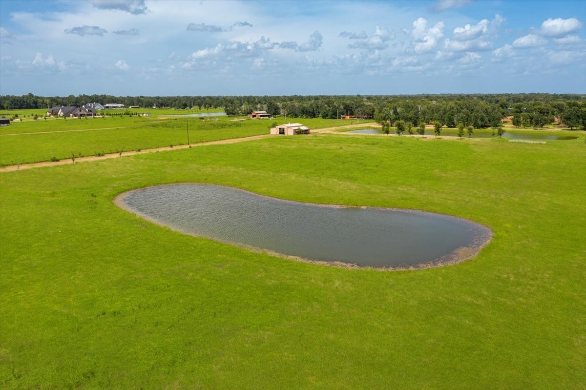 Tbd Guyler Road Wallis, TX 77485 - Photo 13 of 33 a view of a lake with a beach