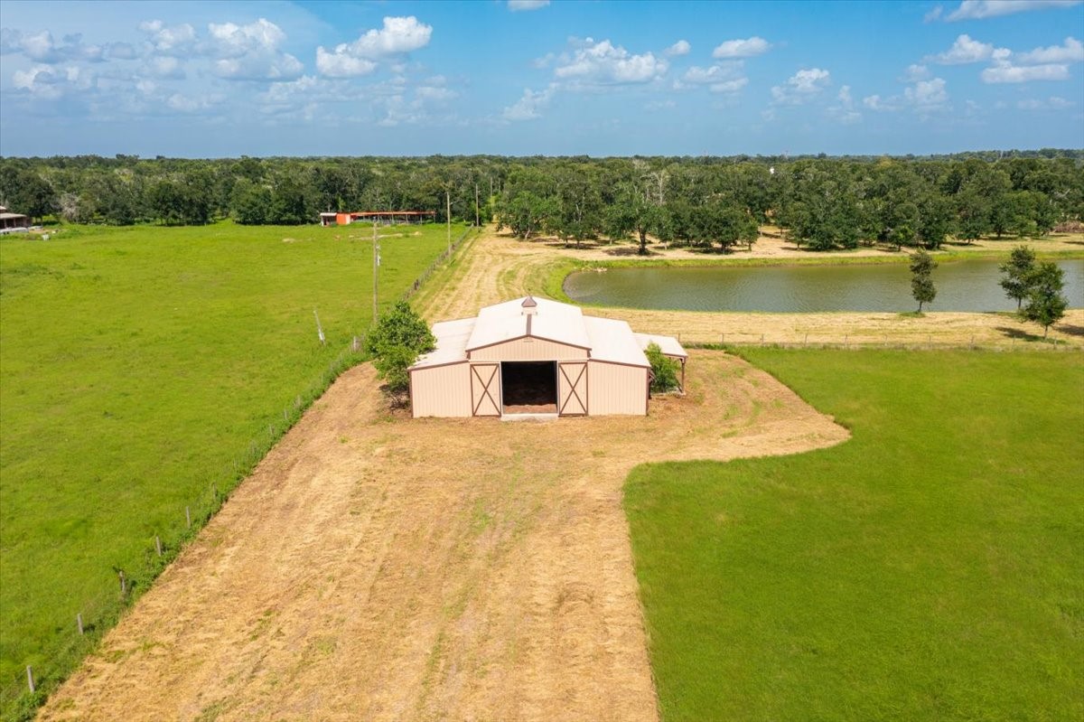 Tbd Guyler Road Wallis, TX 77485 - Photo 4 of 33 a view of a lake with a yard