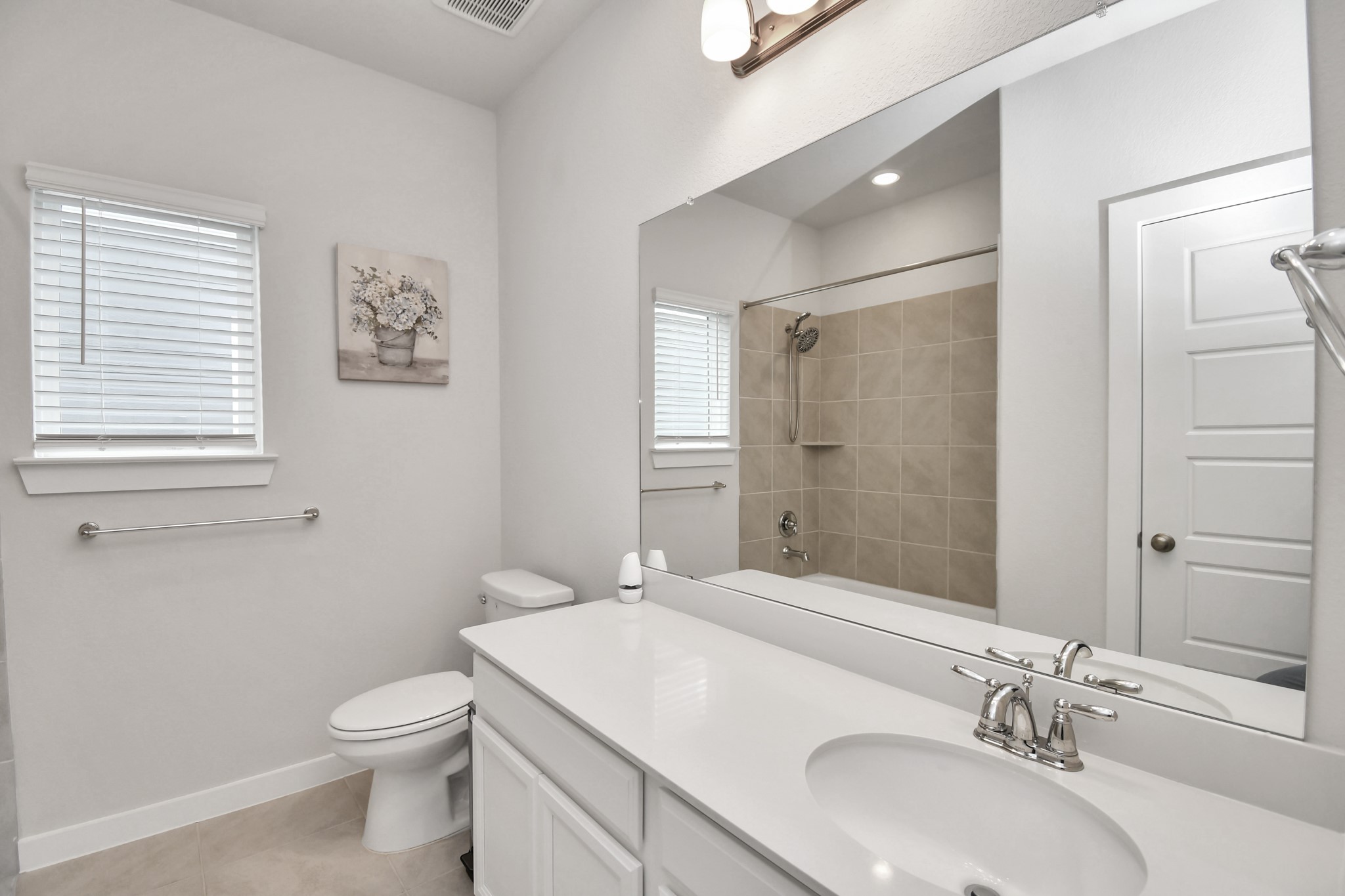 8213 Rising Stream Drive Houston, TX 77063 - Photo 11 of 21 a bathroom with a granite countertop sink toilet and shower