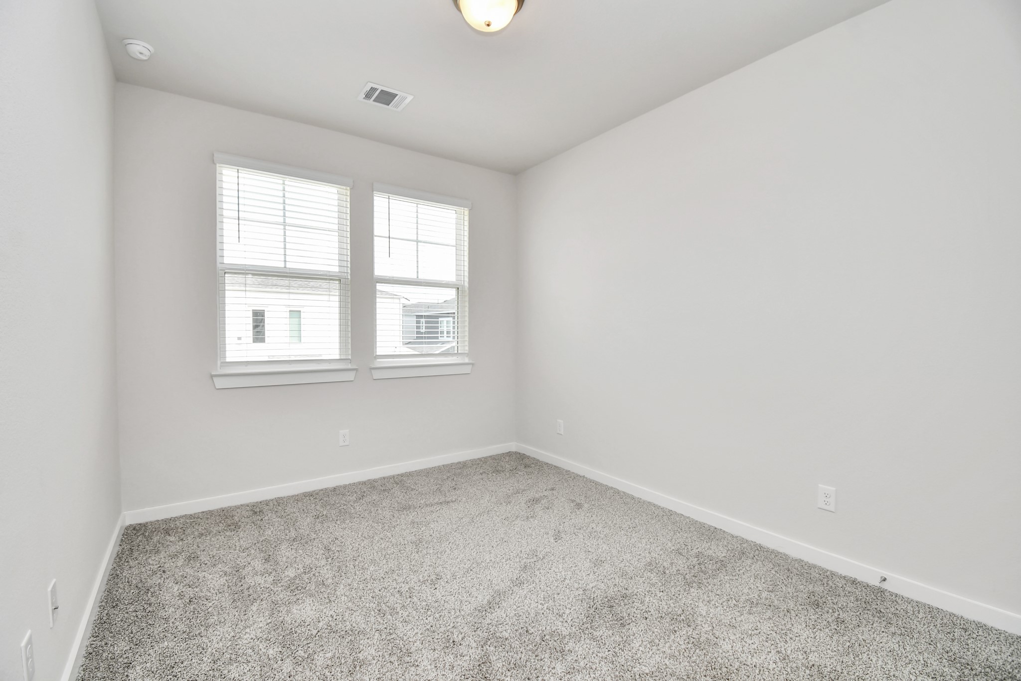 8213 Rising Stream Drive Houston, TX 77063 - Photo 13 of 21 an empty room with a window