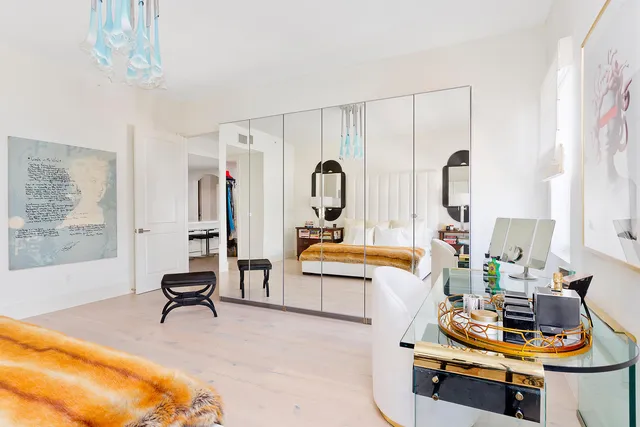 a view of living room with furniture and window