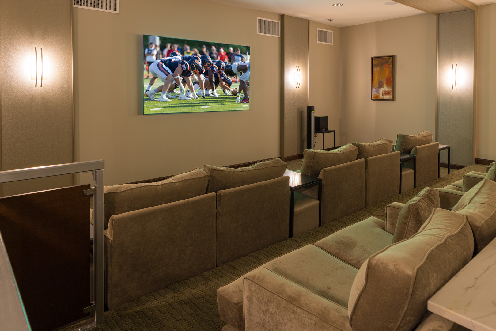 255 North Addison Avenue, Unit 528 Elmhurst, IL 60126 - Photo 16 of 21 a media room with lots of chairs and a projector