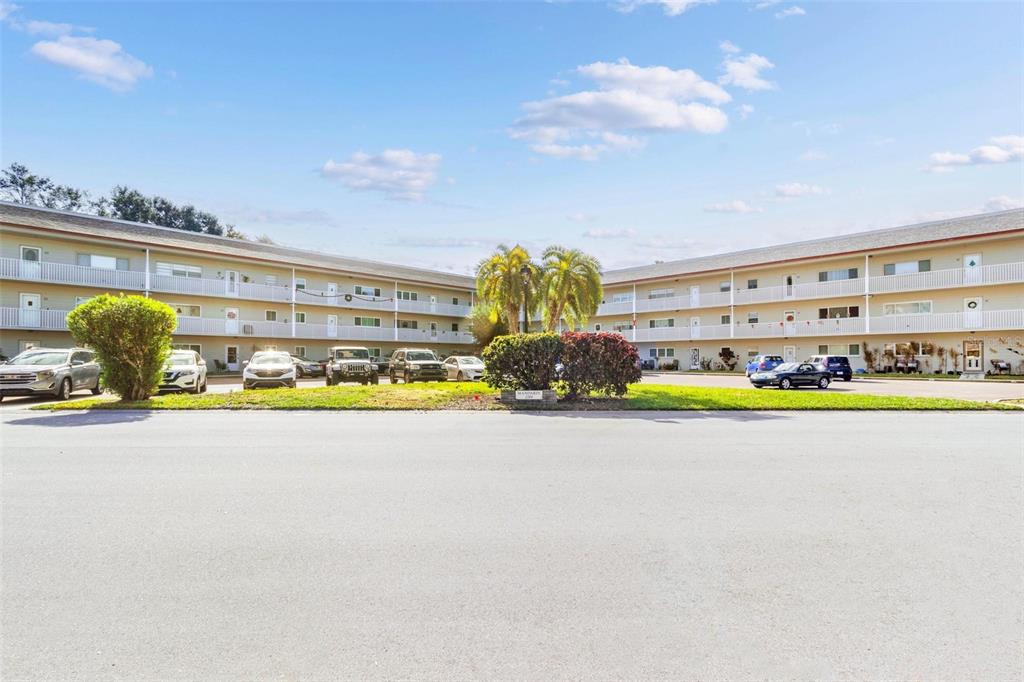 2260 Costa Rican Drive, Unit 50 Clearwater, FL 33763 - Photo 1 of 48 a view of swimming pool with outdoor seating
