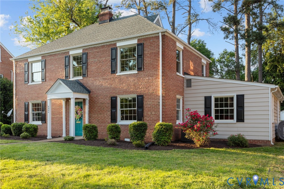 4804 Morrison Road Richmond, VA 23230 - Photo 1 of 48 a front view of a house with a garden and plants