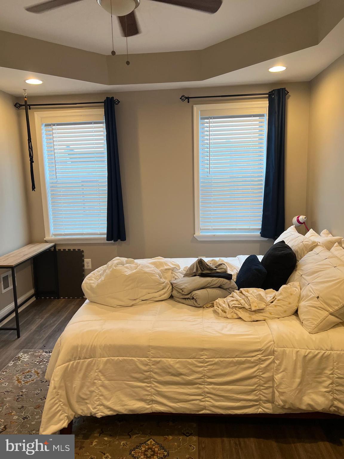 3319 Noble Street Baltimore, MD 21224 - Photo 18 of 31 a bedroom with a bed and window