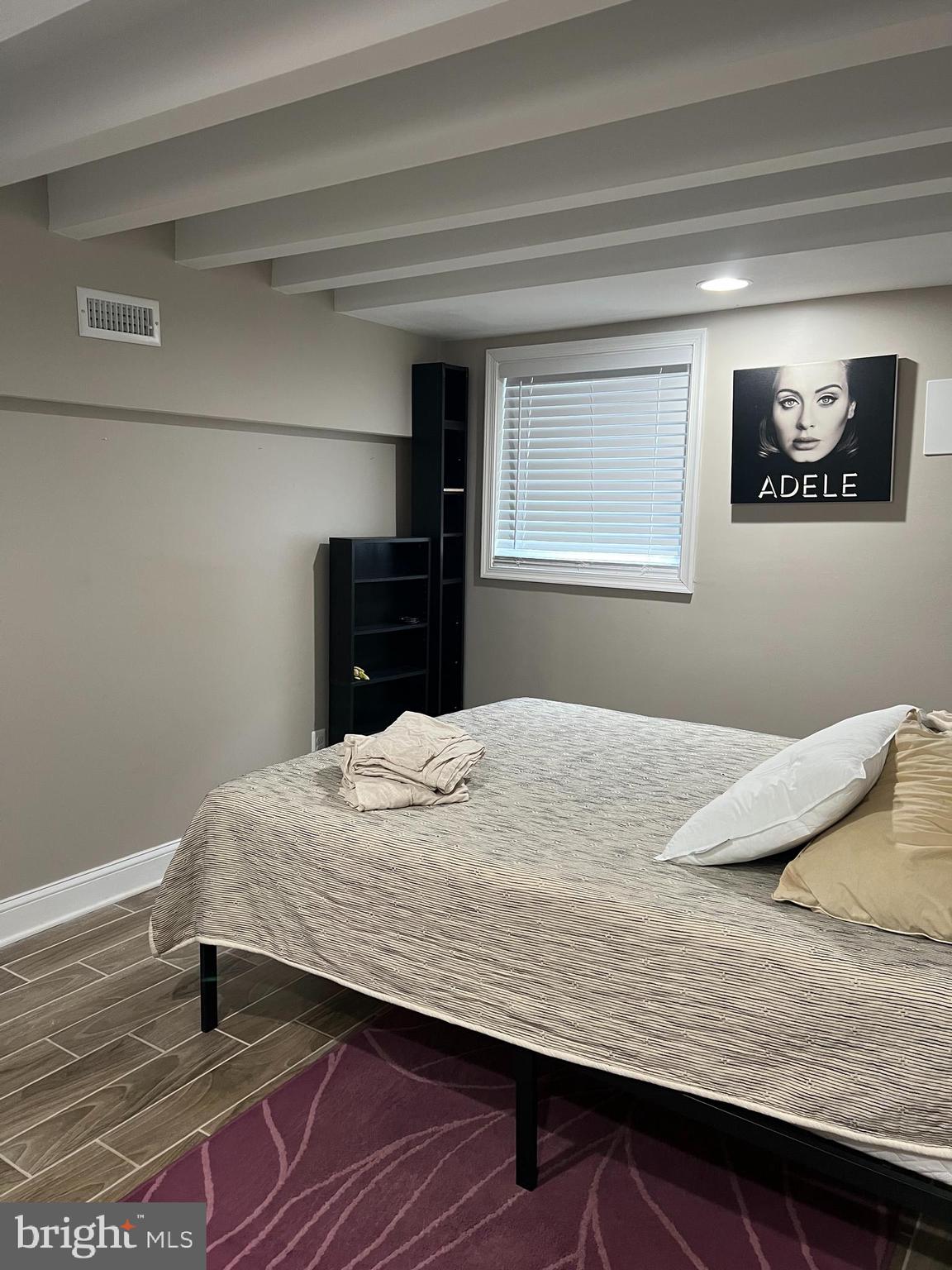 3319 Noble Street Baltimore, MD 21224 - Photo 24 of 31 a bedroom with a bed and a window