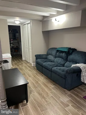 a white toilet sitting next to a bathroom sink