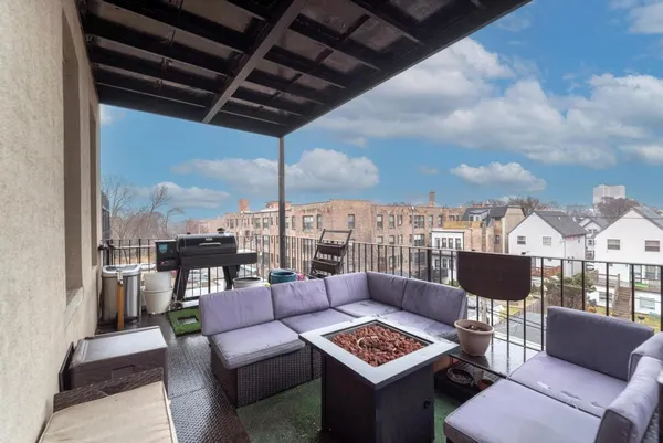 a outdoor living space with furniture