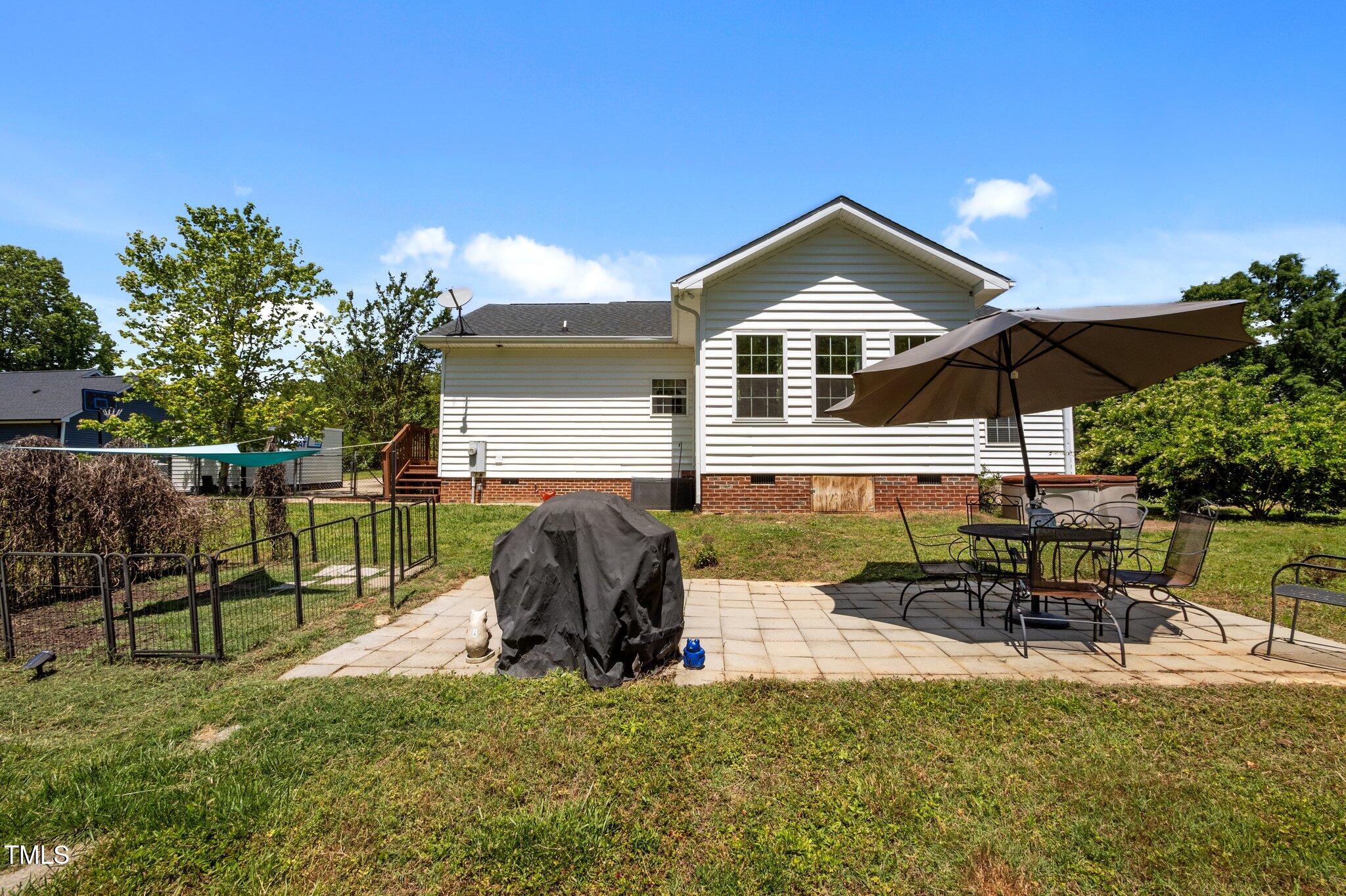 5013 West Pool Road Rougemont, NC 27572 - Photo 21 of 34 a view of a house with patio