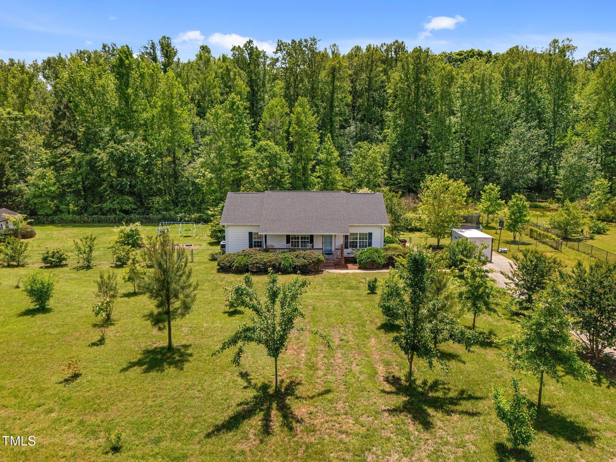5013 West Pool Road Rougemont, NC 27572 - Photo 34 of 34 a view of a big yard with large trees