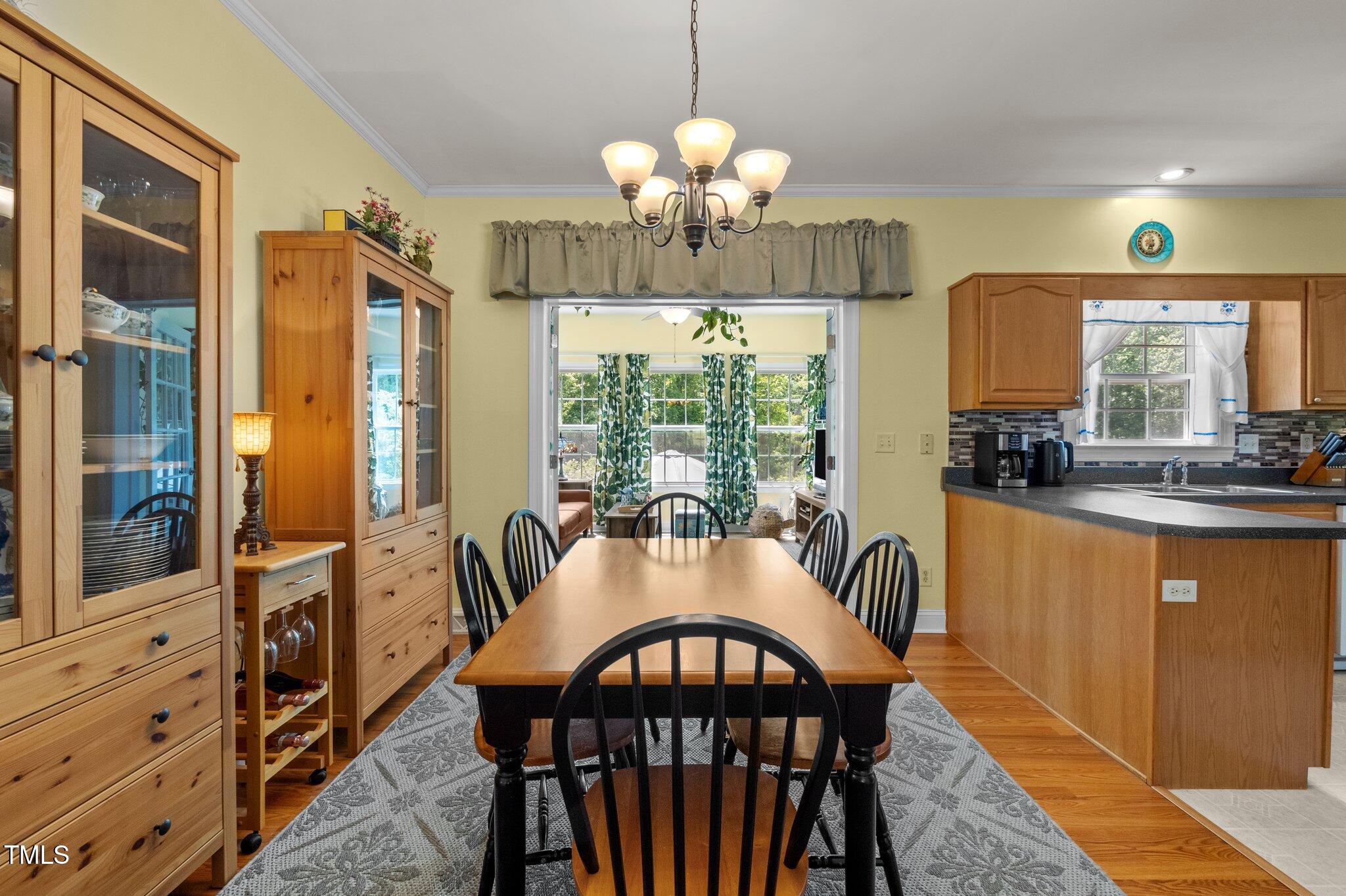 5013 West Pool Road Rougemont, NC 27572 - Photo 7 of 34 a view of a dining room with furniture window and outside view