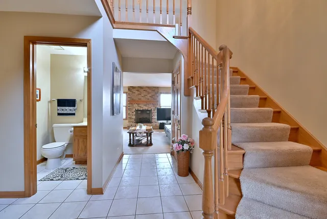 a view of a hallway with living room and furniture