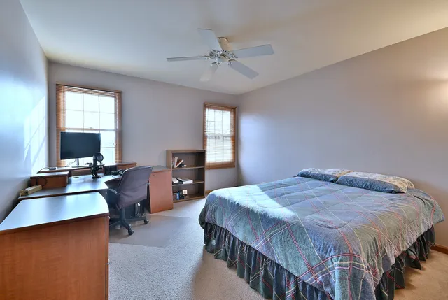 a view of a storage room with a table and chairs