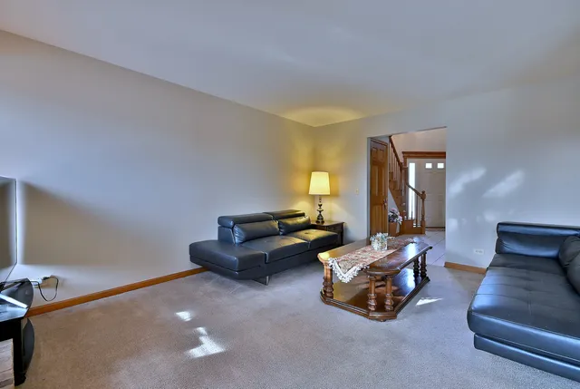 a living room with furniture and a couch