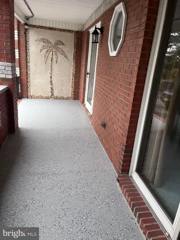 a view of a house with a yard and plants