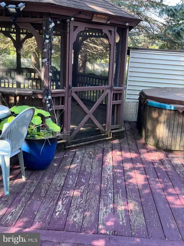 a kitchen with granite countertop a refrigerator and a sink