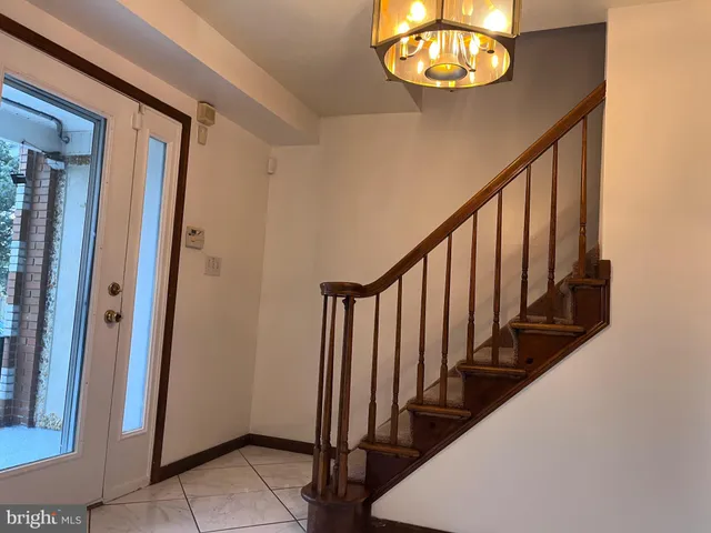 a kitchen with stainless steel appliances granite countertop a refrigerator sink and cabinets