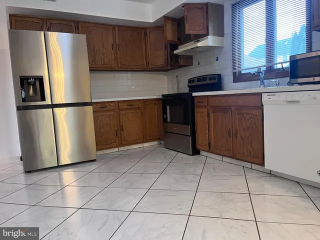 a view of a livingroom with a staircase