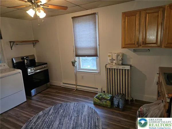 a view of entryway with wooden floor