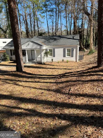 a front view of a house with a ocean view
