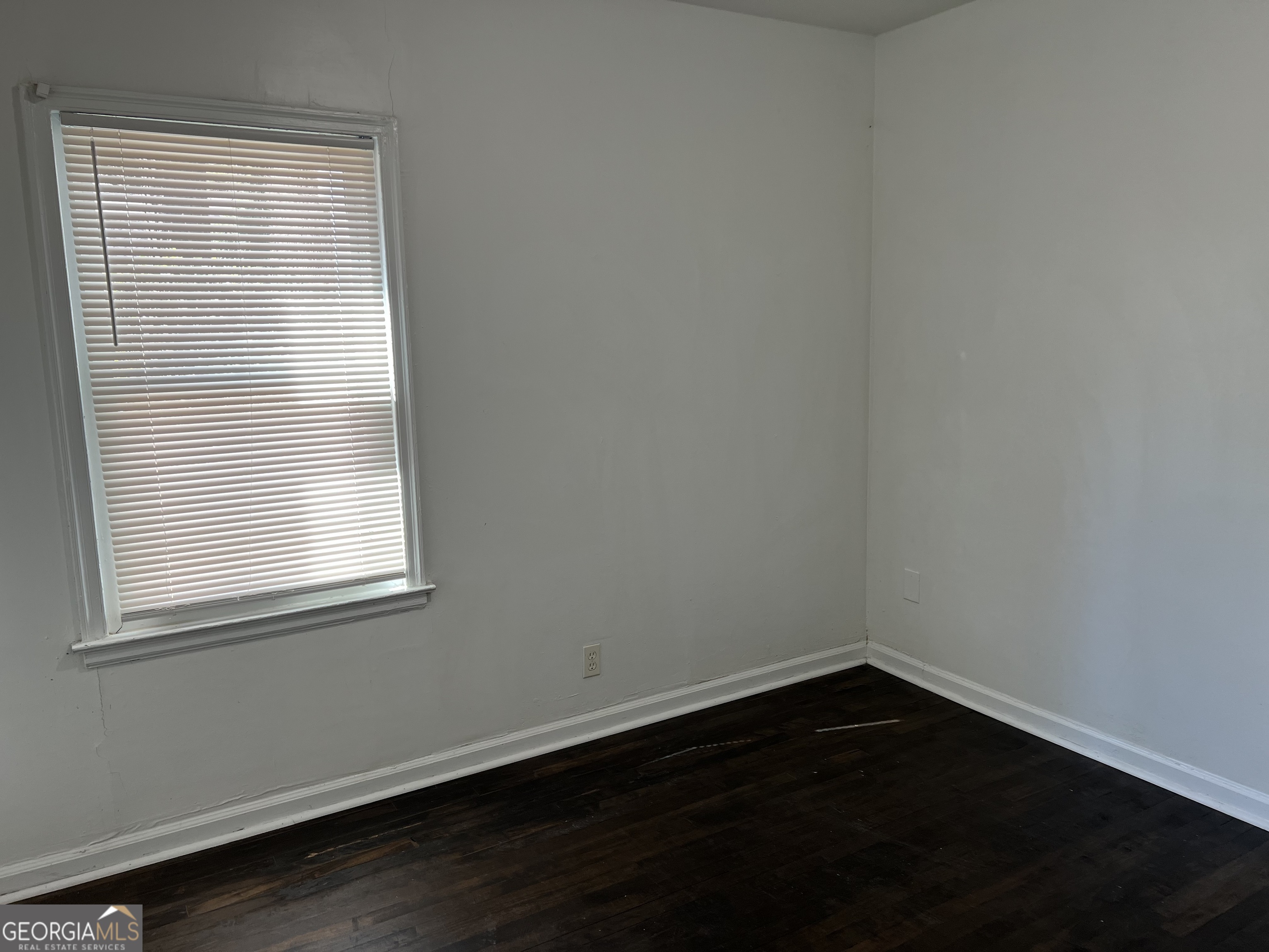 2158 Beecher Road Southwest, Unit A Atlanta, GA 30311 - Photo 17 of 20 an empty room with a window