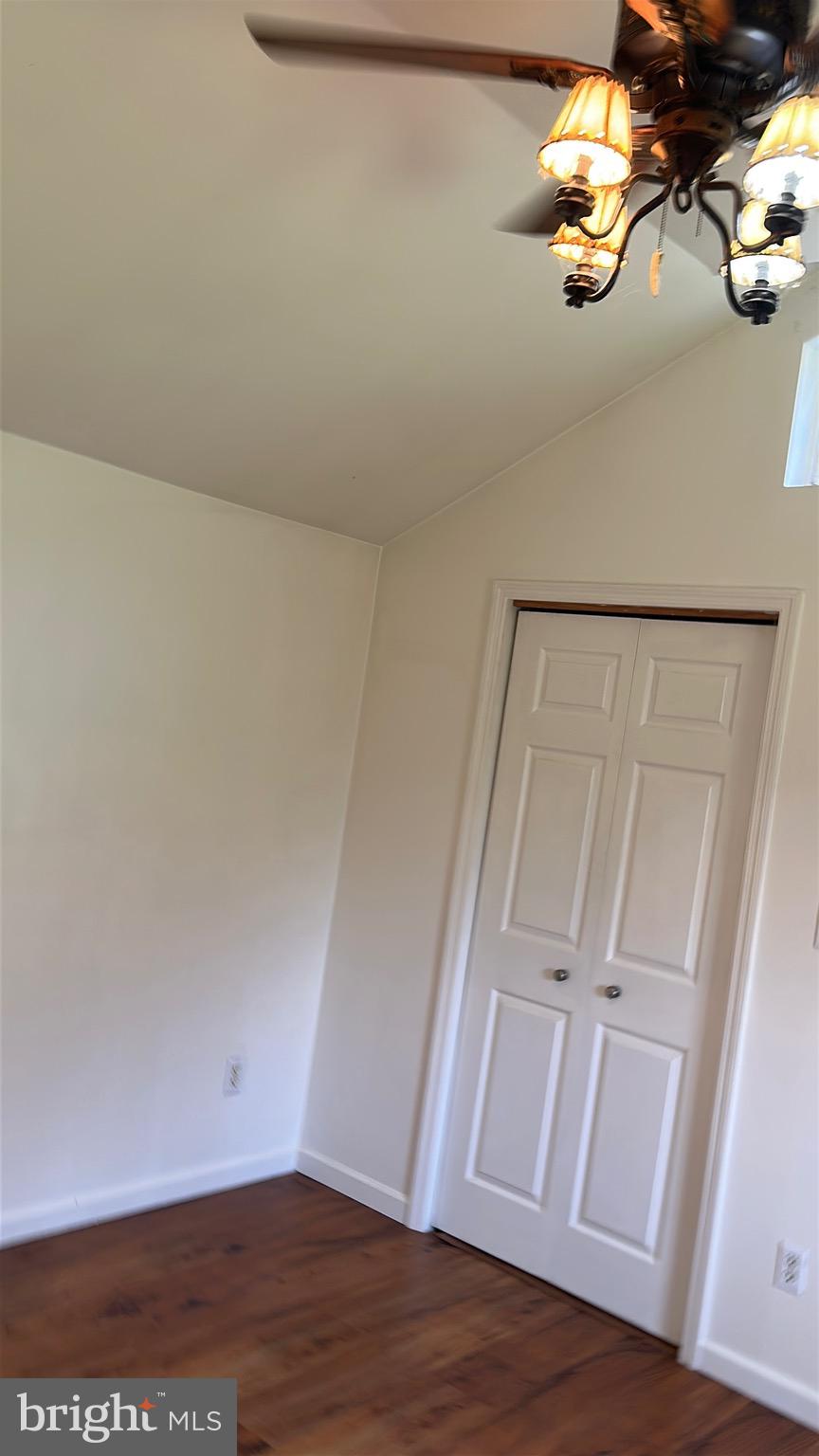 2084 Silvers Road Berkeley Springs, WV 25411 - Photo 15 of 31 a view of empty room with wooden floor