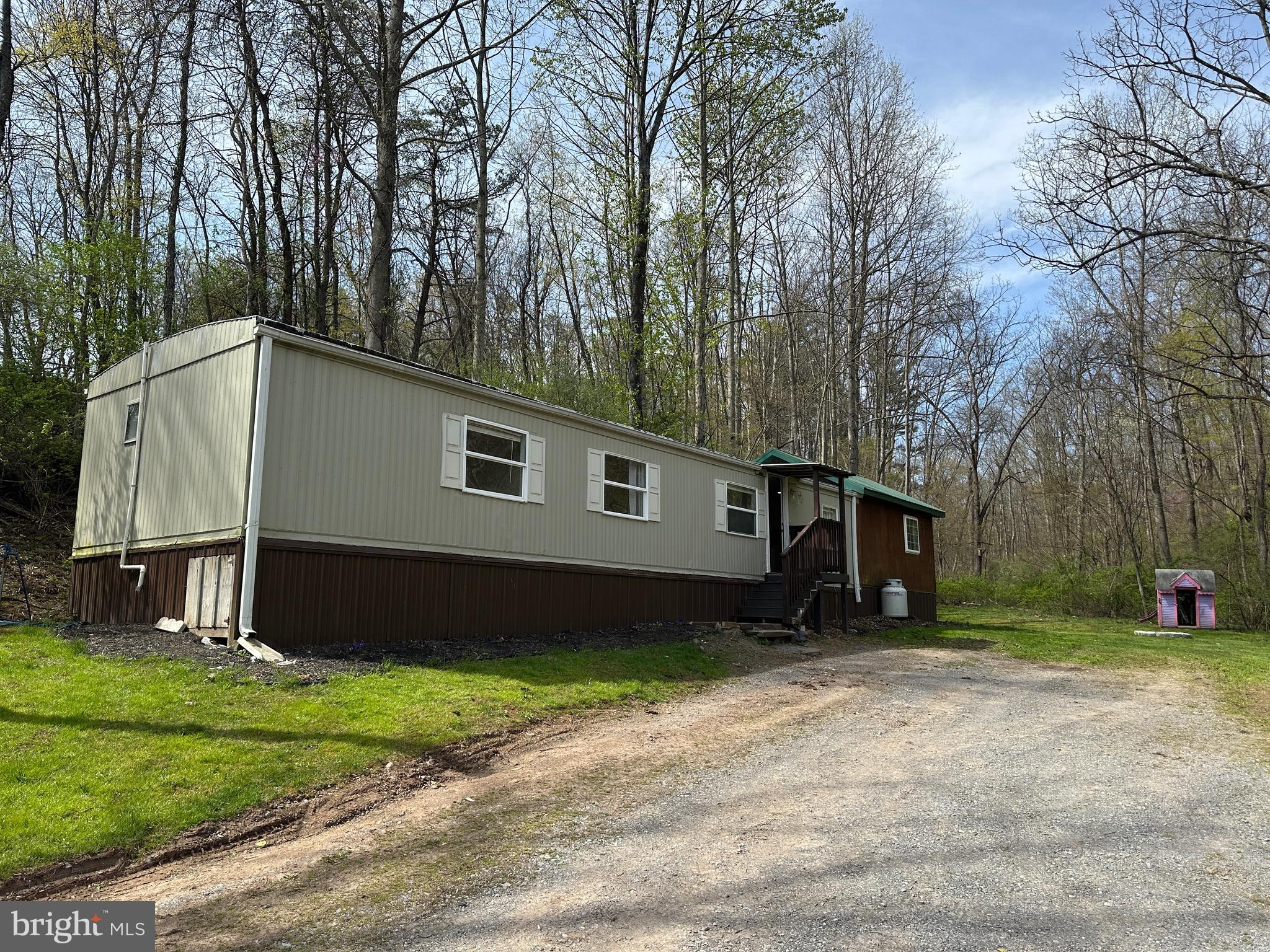 2084 Silvers Road Berkeley Springs, WV 25411 - Photo 19 of 31 a house that has a backyard