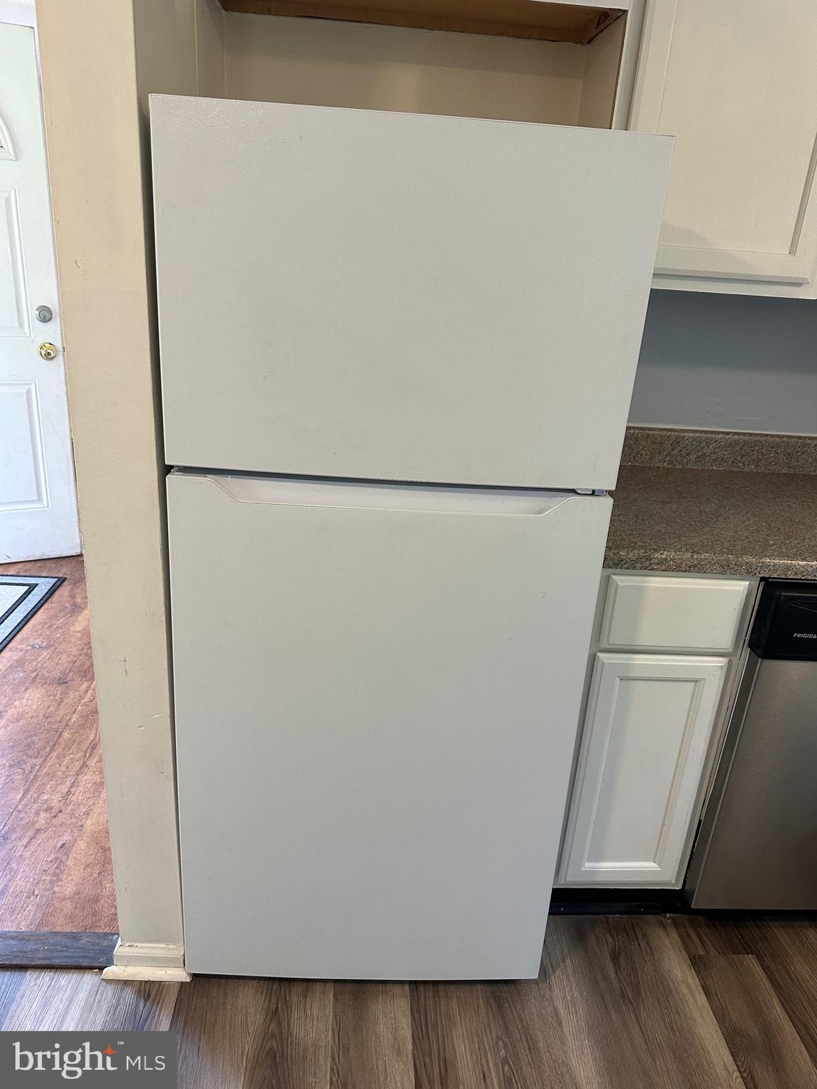 2084 Silvers Road Berkeley Springs, WV 25411 - Photo 29 of 31 a view of washer and dryer with wooden floor