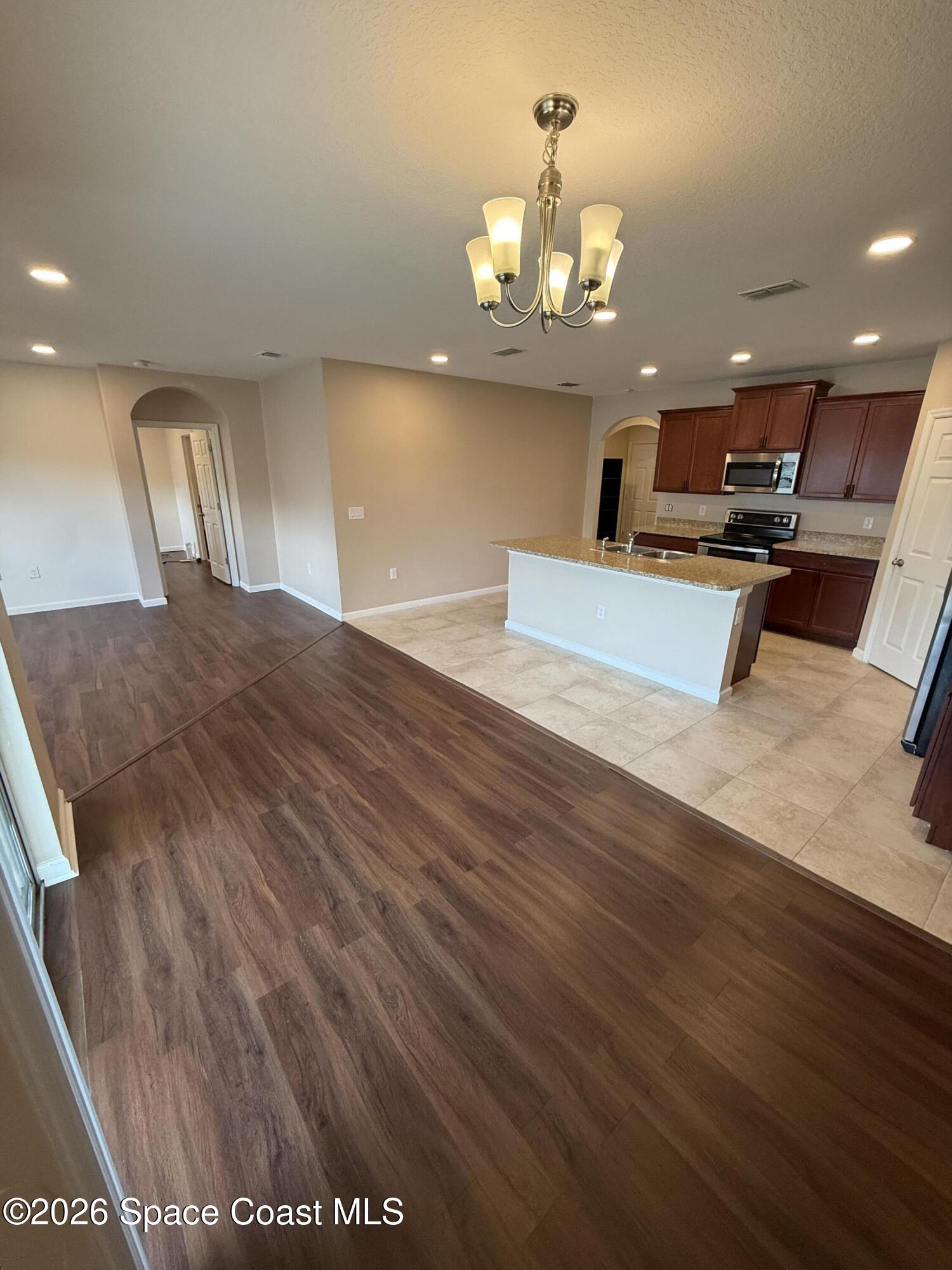 1070 Swiss Pointe Lane Rockledge, FL 32955 - Photo 8 of 18 a view of a lobby with wooden floor