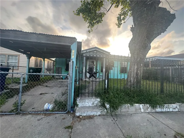 a view of a entrance gate of a house