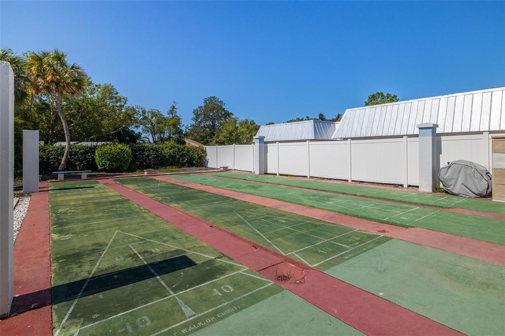 4239 Tamargo Drive New Port Richey, FL 34652 - Photo 22 of 26 a view of a tennis court