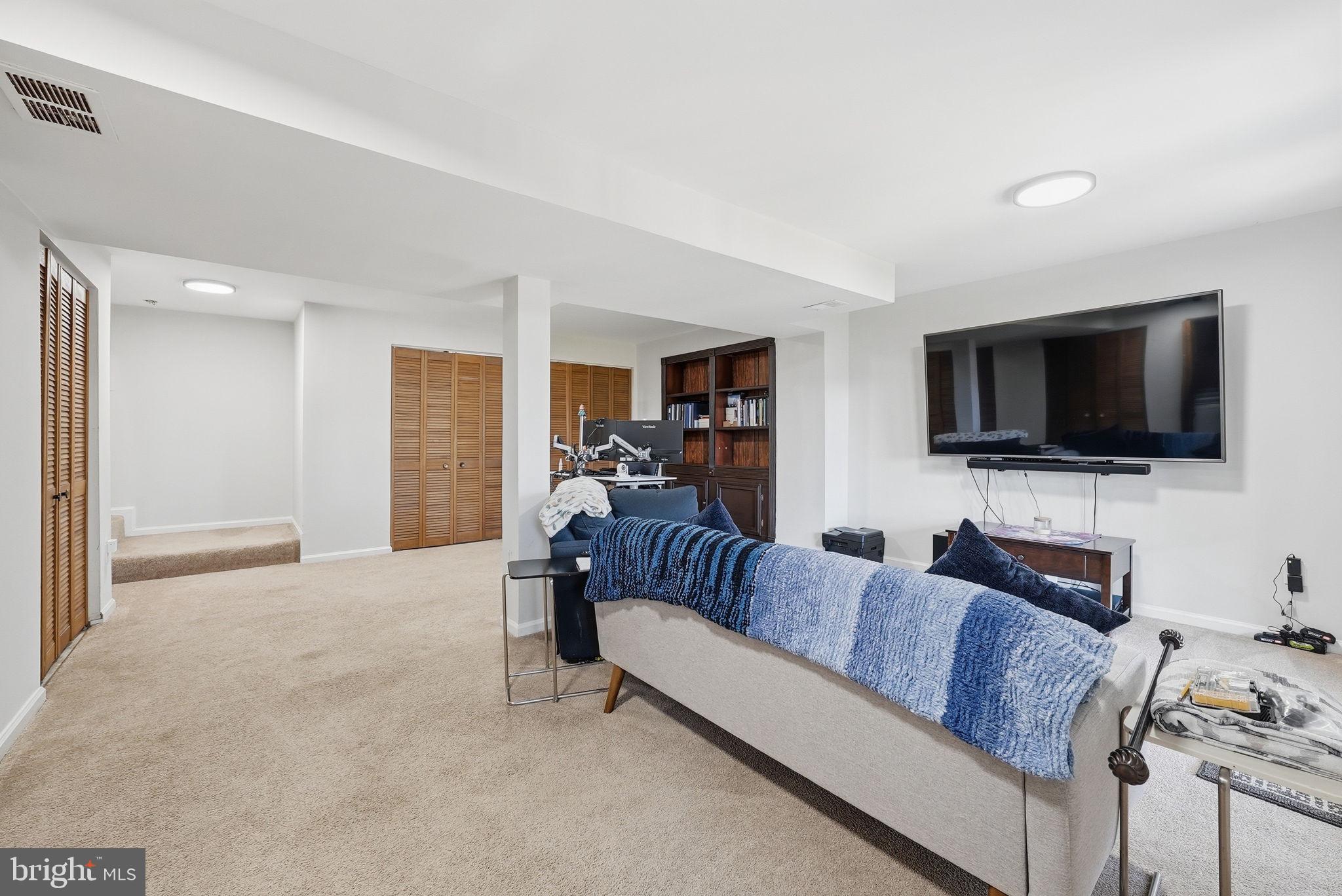 9236 Labelle Lane Gaithersburg, MD 20879 - Photo 24 of 33 Spacious, modern living area retreat.