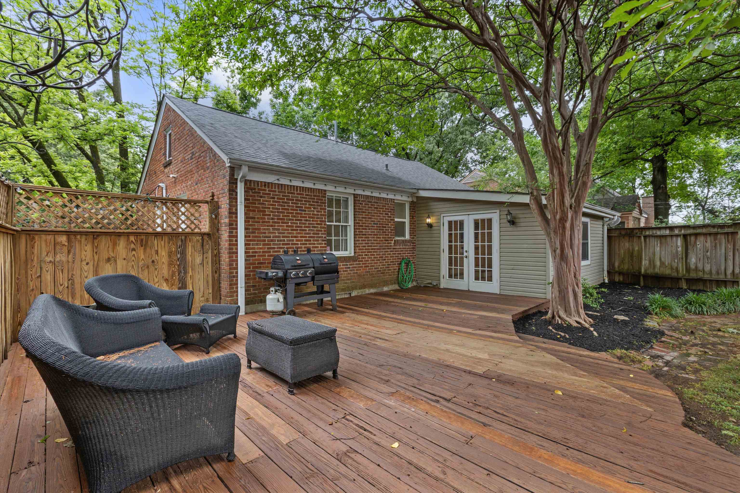 100 South Greer Street Memphis, TN 38111 - Photo 22 of 26 a view of a house with backyard and sitting area