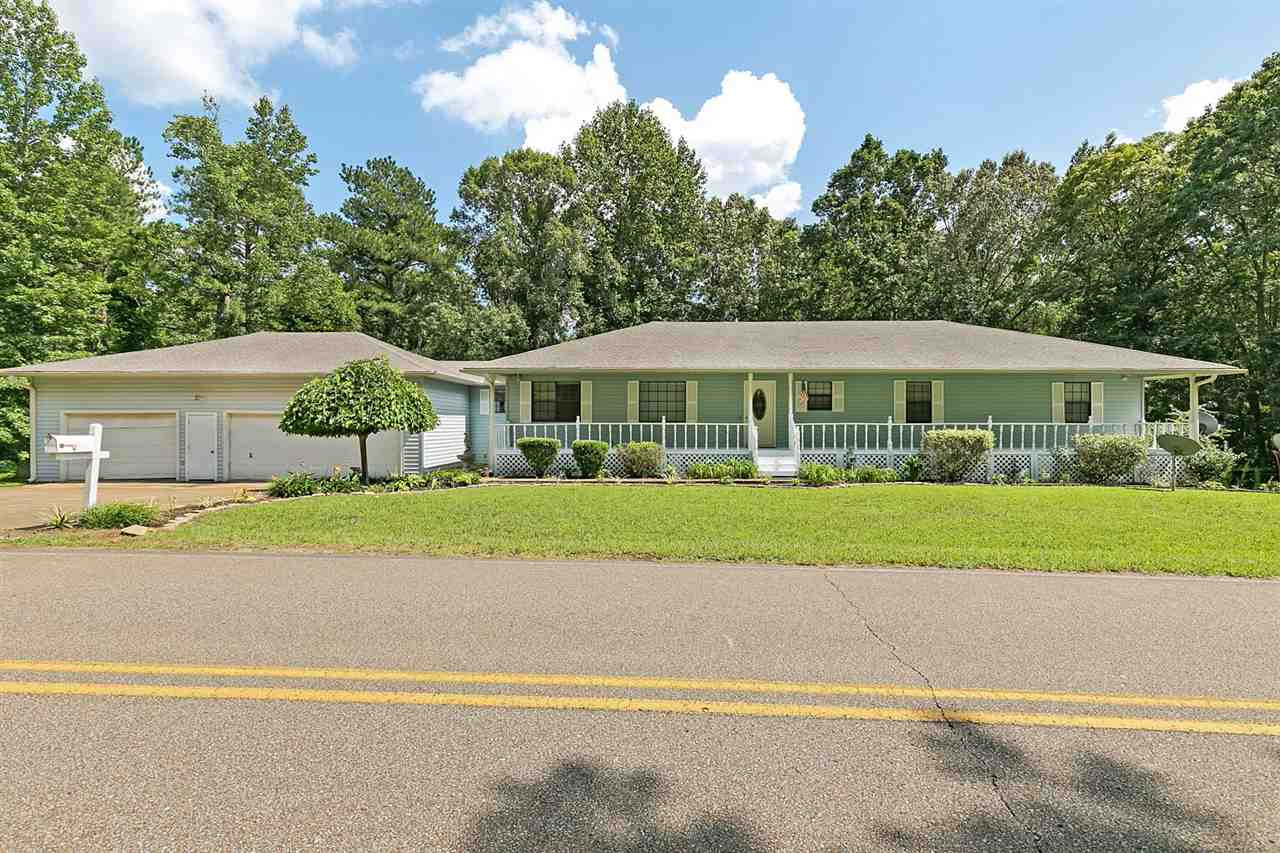 1995 Center Hill-Wright Road Reagan, TN 38368 - Photo 1 of 1 a view of a house with a yard and potted plants