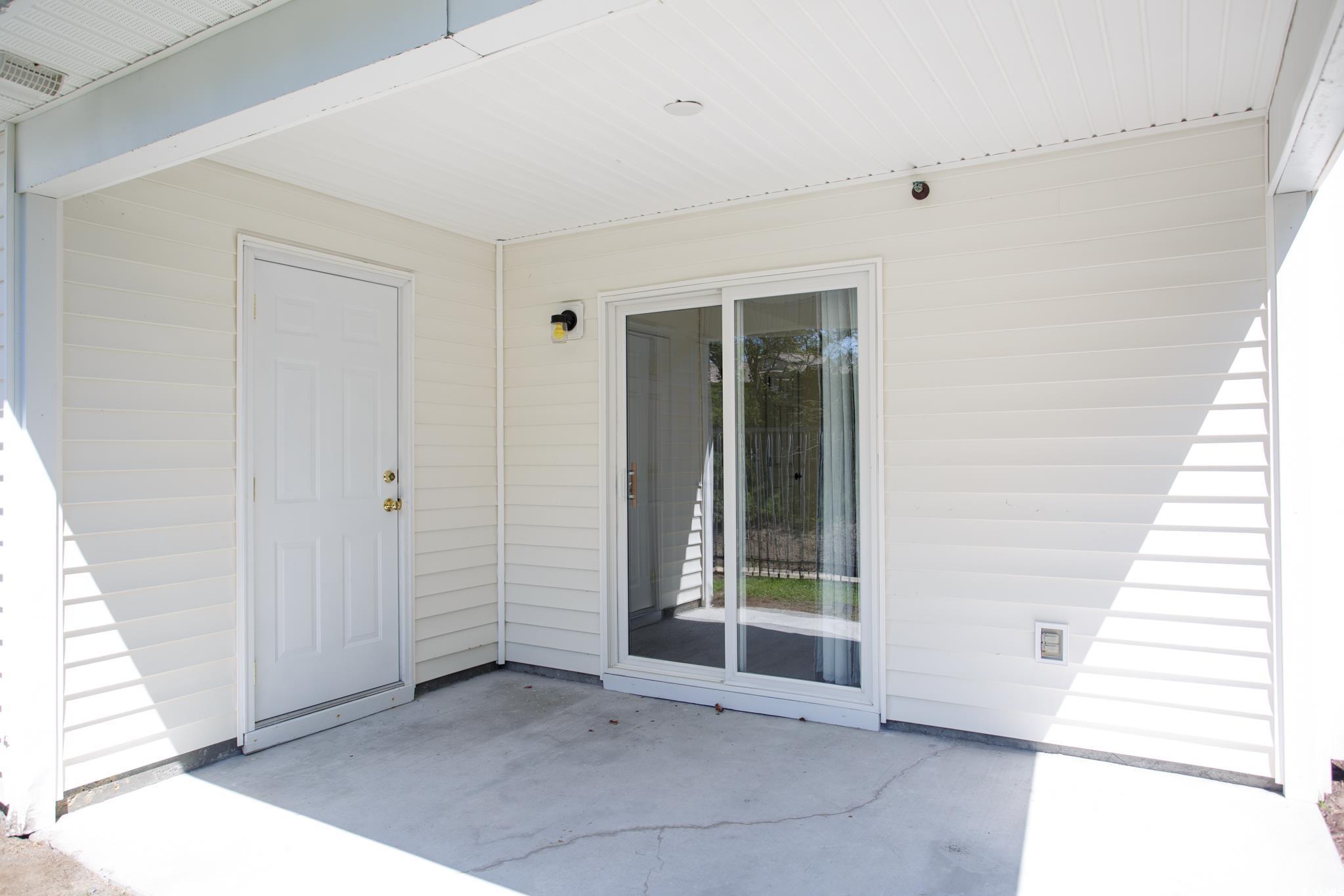 116 Barnacle Lane, Unit 1 Little River, SC 29566 - Photo 19 of 27 Entrance to property featuring a patio
