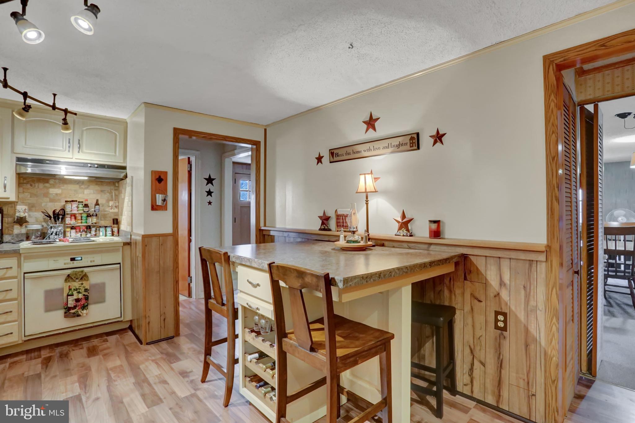 198 Eastbrook Road Smoketown, PA 17602 - Photo 13 of 35 a view of a kitchen area with furniture and wooden floor