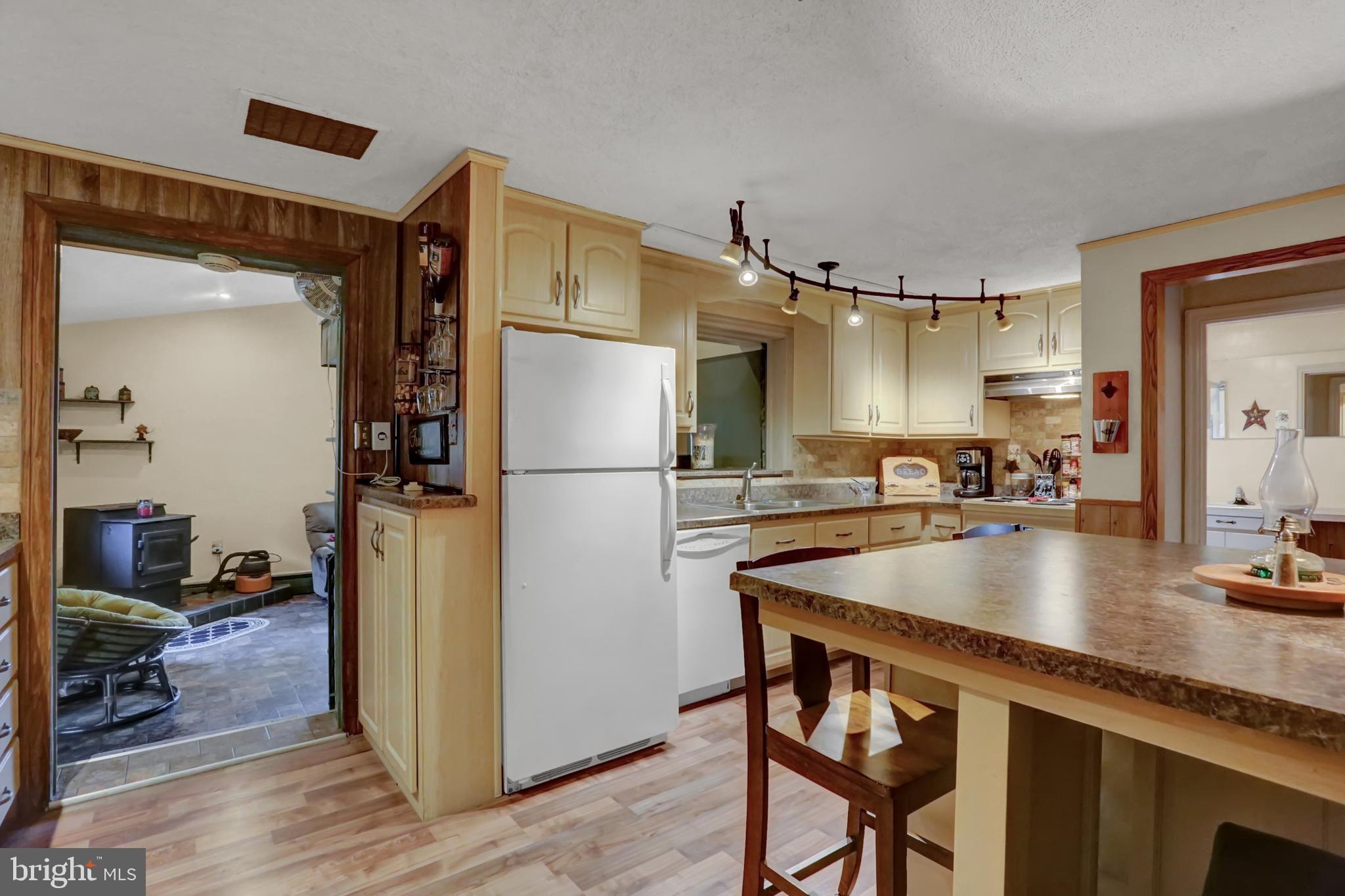 198 Eastbrook Road Smoketown, PA 17602 - Photo 14 of 35 a kitchen with refrigerator and countertop