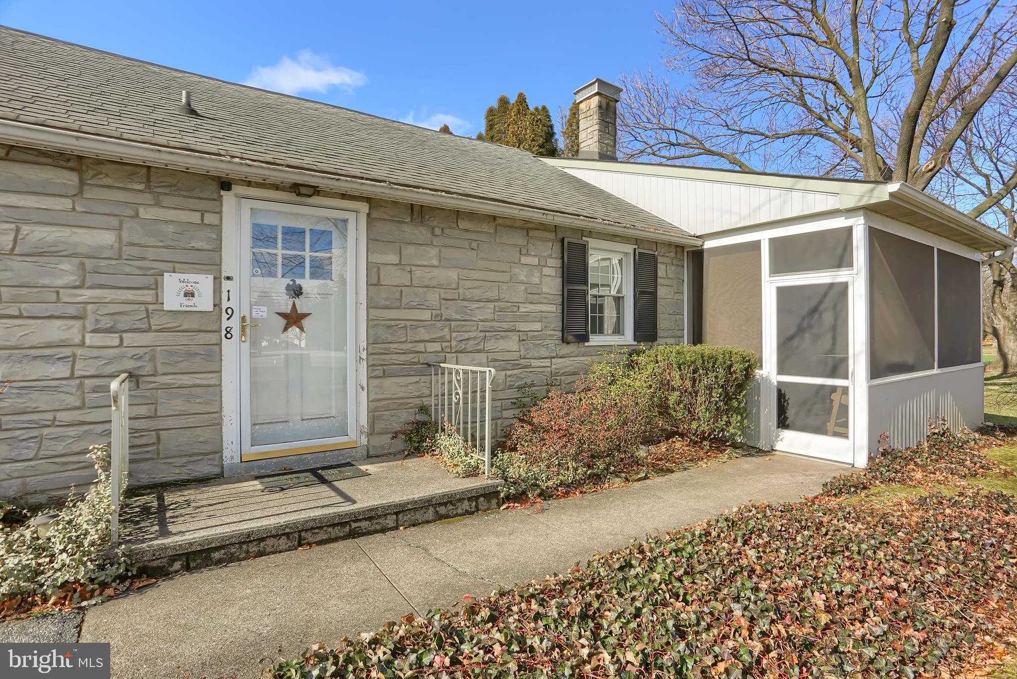 198 Eastbrook Road Smoketown, PA 17602 - Photo 3 of 35 a view of a house with a small yard and wooden fence