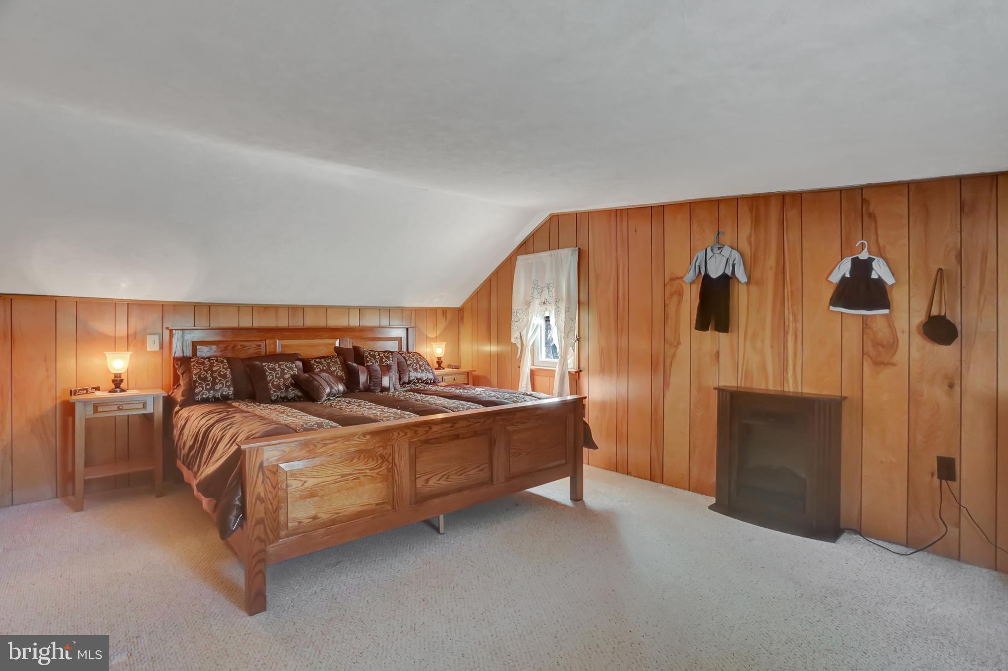 198 Eastbrook Road Smoketown, PA 17602 - Photo 28 of 35 a bed room with a bed and a walk in closet