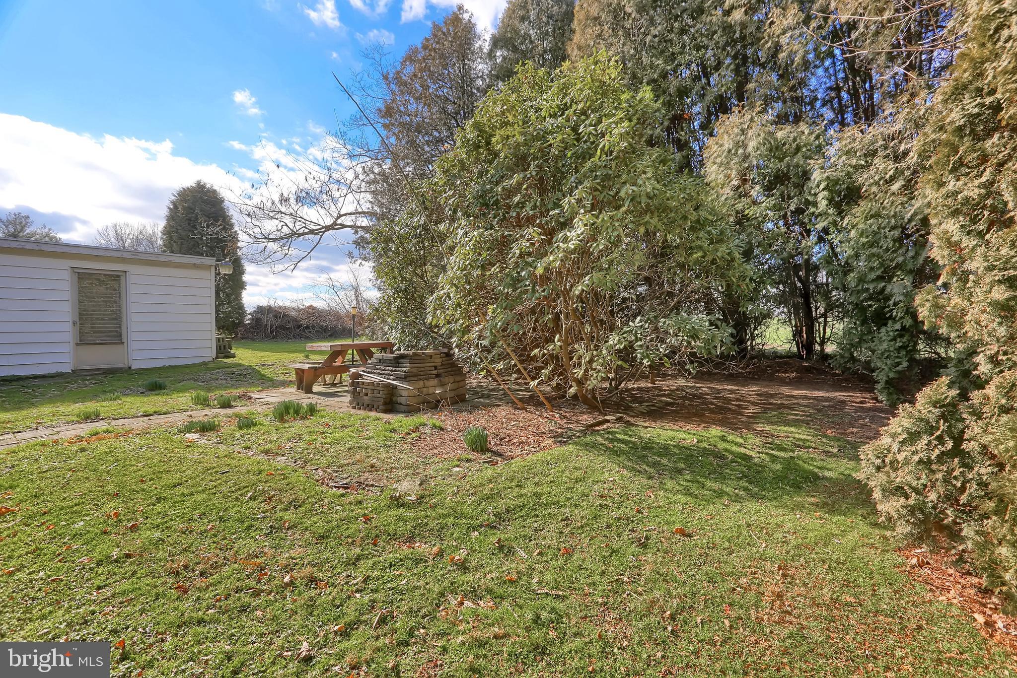 198 Eastbrook Road Smoketown, PA 17602 - Photo 32 of 35 a backyard of a house with a yard and outdoor seating