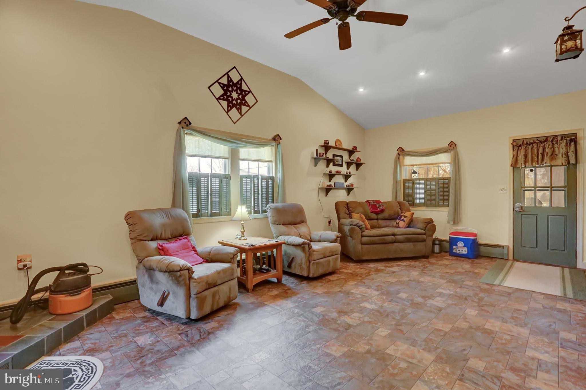 198 Eastbrook Road Smoketown, PA 17602 - Photo 8 of 35 a living room with furniture and a floor to ceiling window