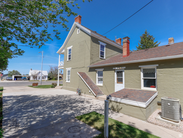 155 West Center Street Fillmore, UT 84631 - Photo 55 of 86 Exterior siding in a muted green hue complemented by white trim