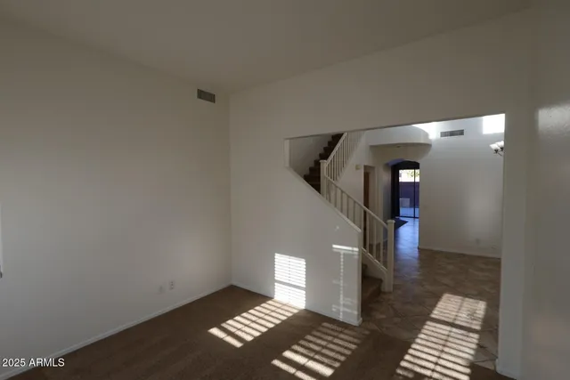 a view of an empty room and window