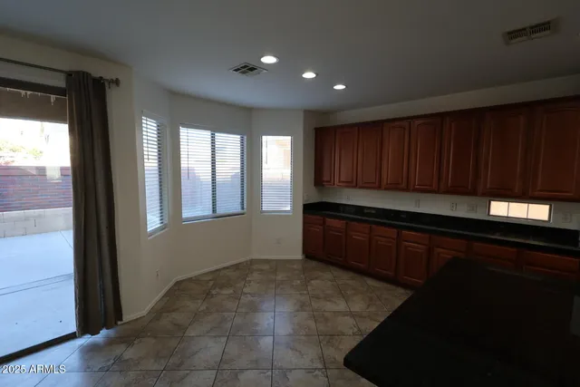 a front view of a house with patio