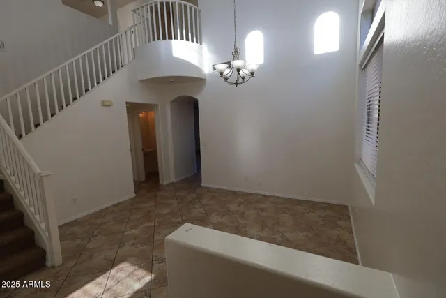 a kitchen with kitchen island granite countertop wooden cabinets a sink and dishwasher