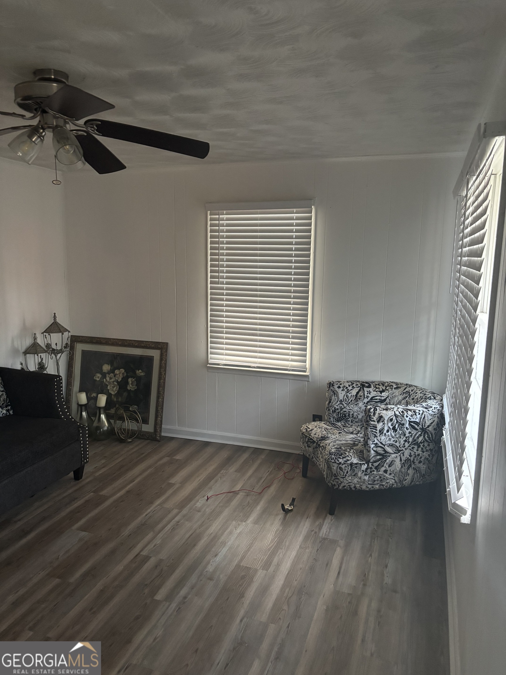 614 Alfred C Carson Street Sandersville, GA 31082 - Photo 13 of 22 a living room with furniture and a window