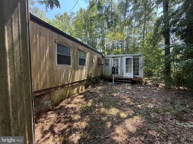 a backyard of a house with garden