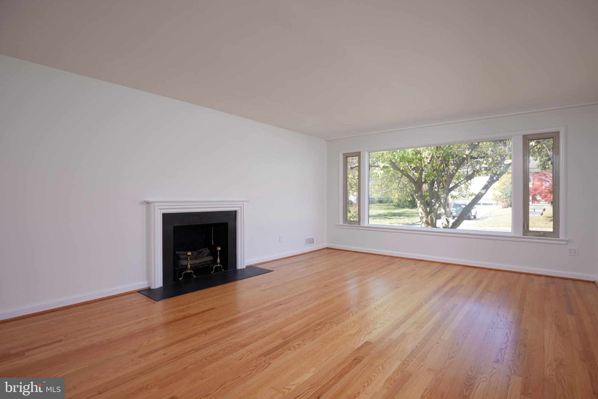 5505 Uppingham Street Chevy Chase, MD 20815 - Photo 5 of 28 Light-Filled Living Room with a HUGE Window